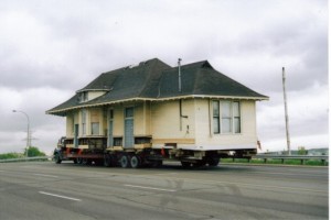 Freeman Station on trailer being moved along city road 2000?